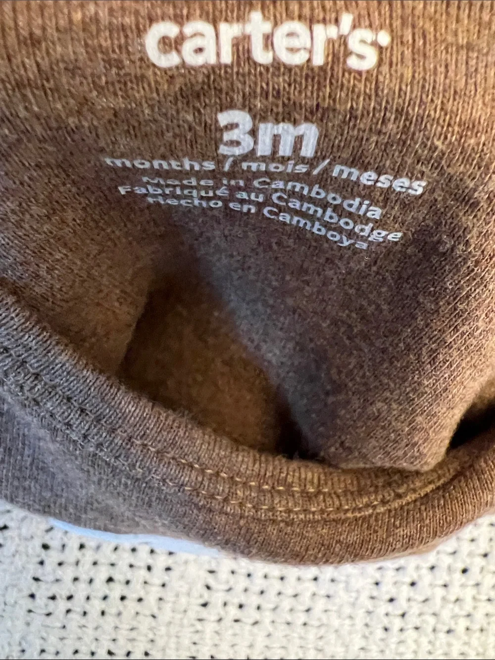 Carter’s | Brown Football-Stitch Long-Sleeve Baby One-Piece Size 3 Months